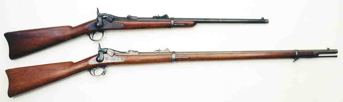 The U.S. Army adopted these Model 1873s along with the new .45 Government round: a cavalry carbine (top) and an infantry rifle (bottom).